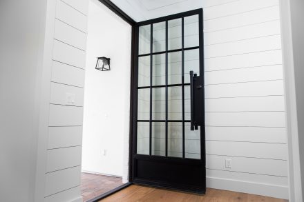 modern black iron and glass iron entry door