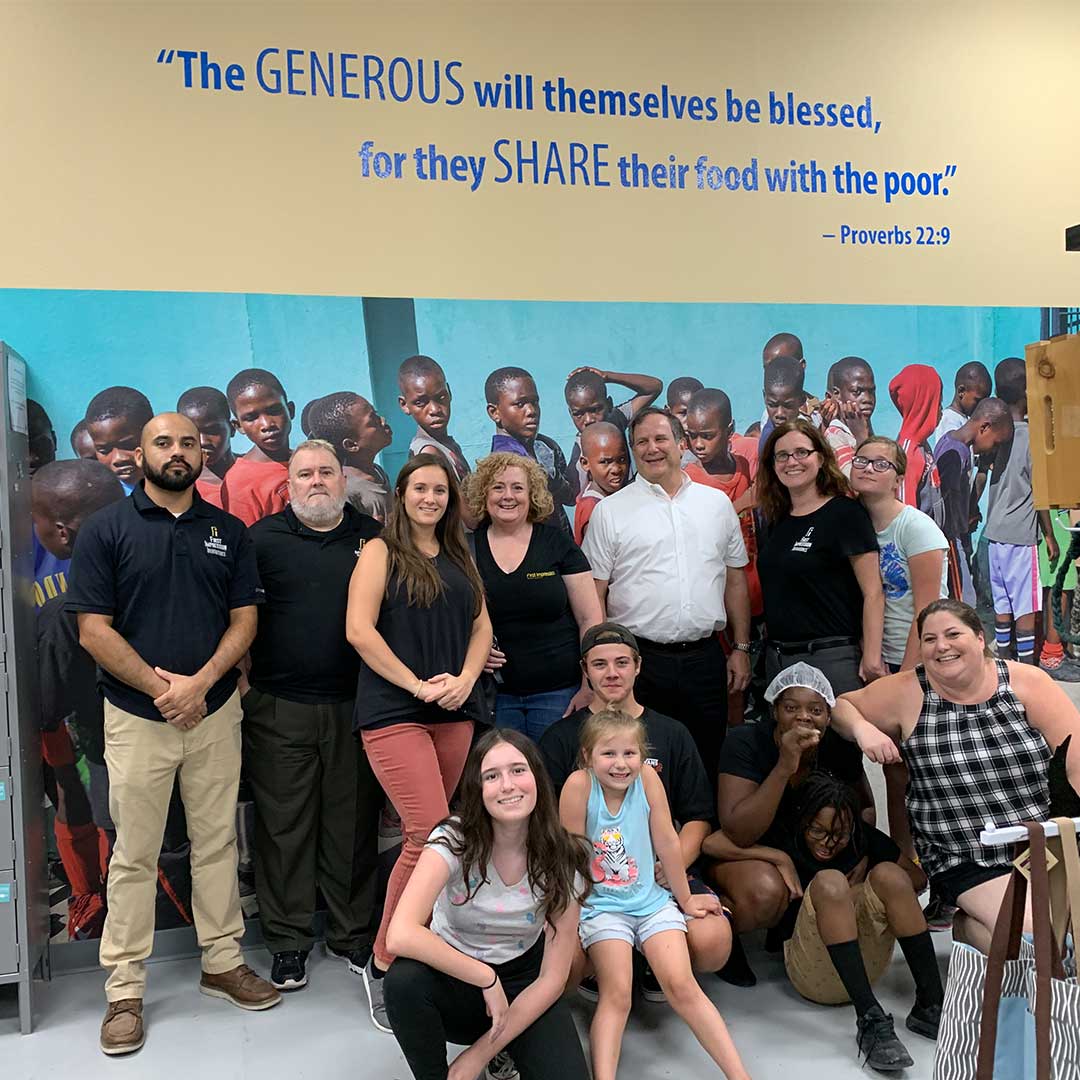 1st Impression Ironworks Employees Group Picture at Feed My Starving Children