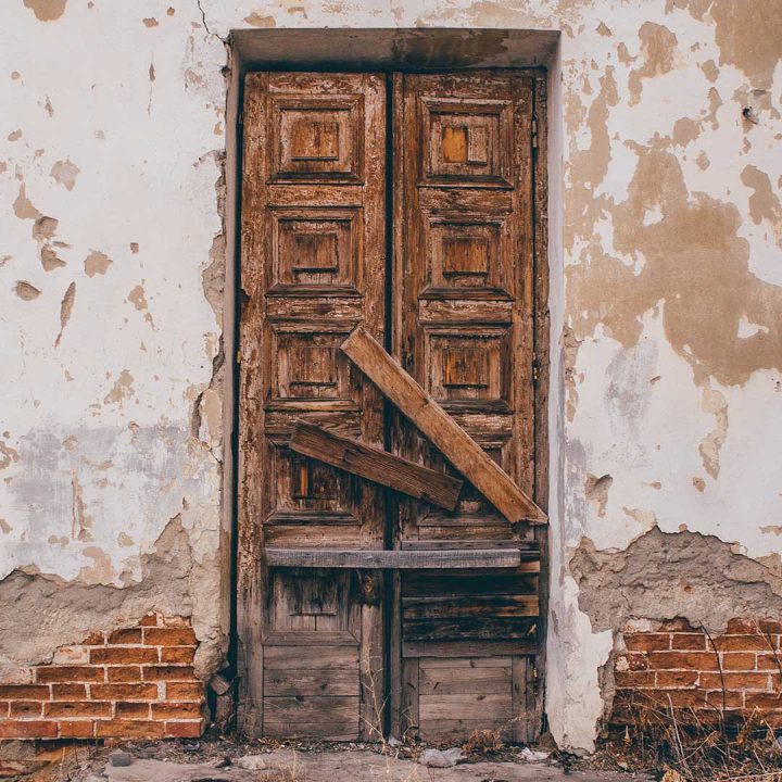 old wood doors without proper sealing let heat through