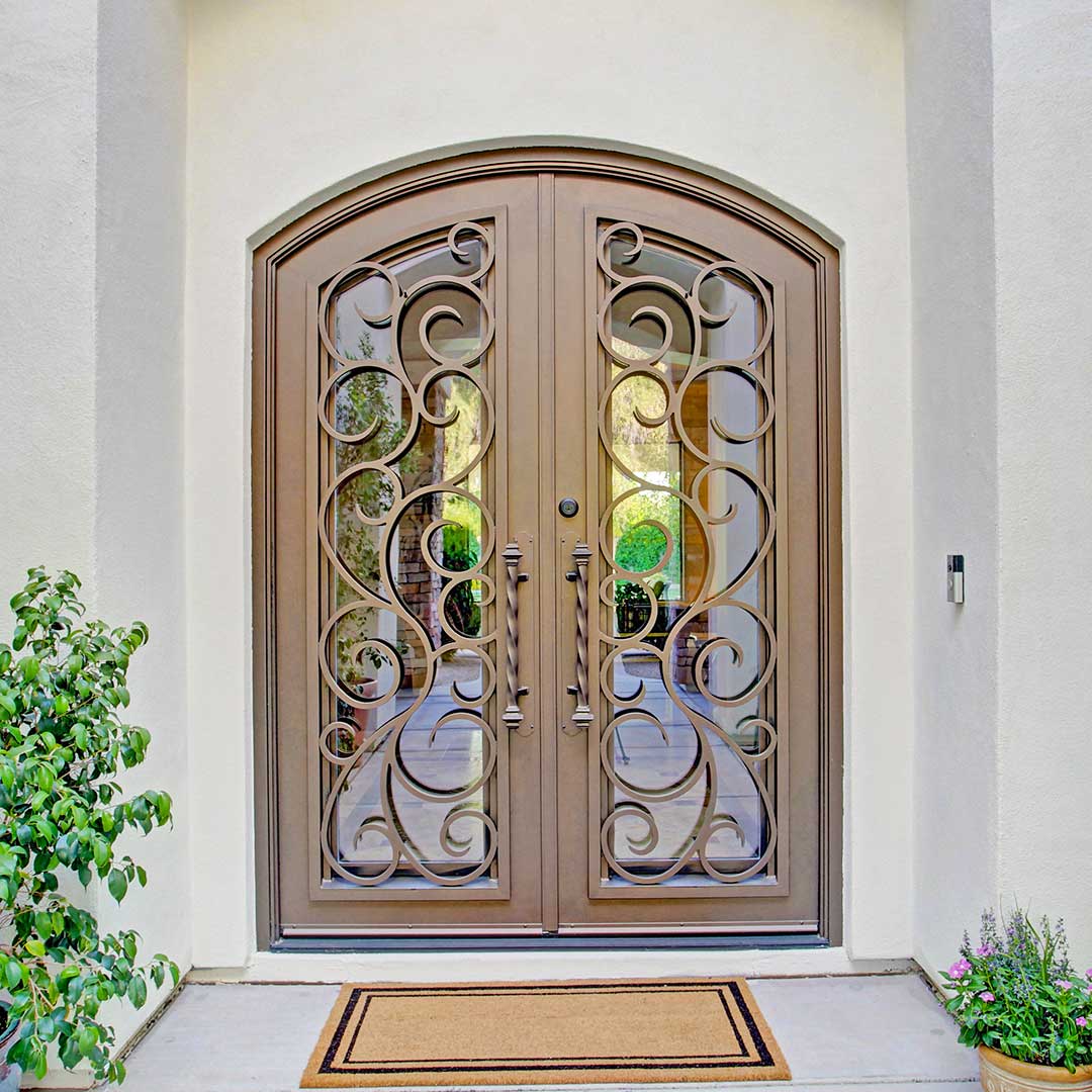 Arched French Iron and Glass Entry Door with scrollwork