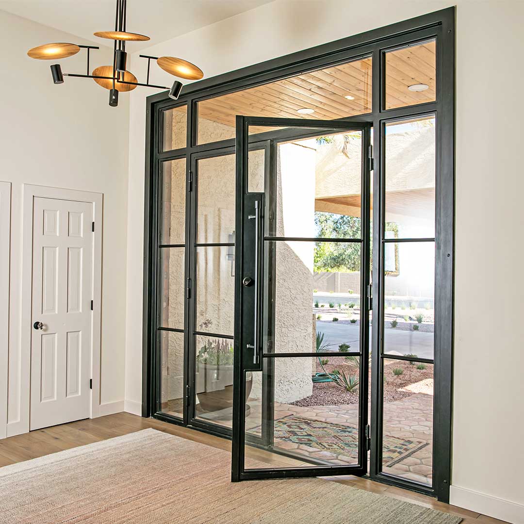 Angled image of a contemporary iron and glass entry door