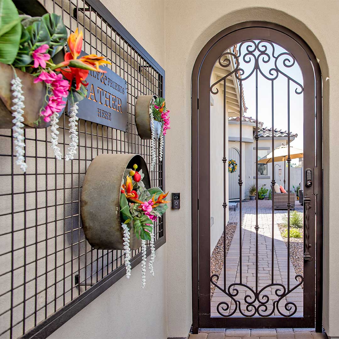 arched iron courtyard gate