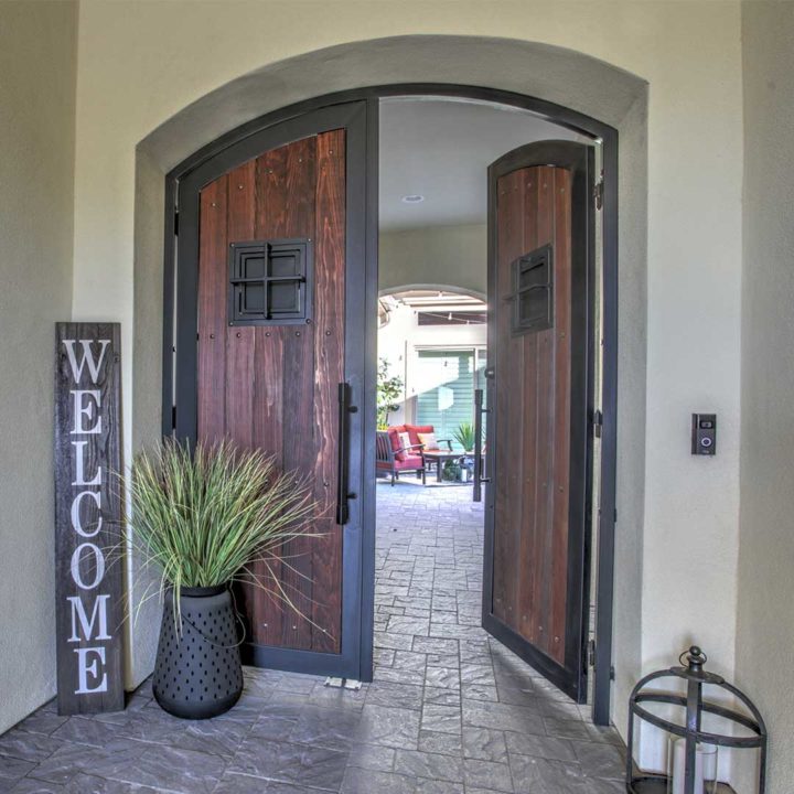 First impression Ironworks arched french wood and iron courtyard gate