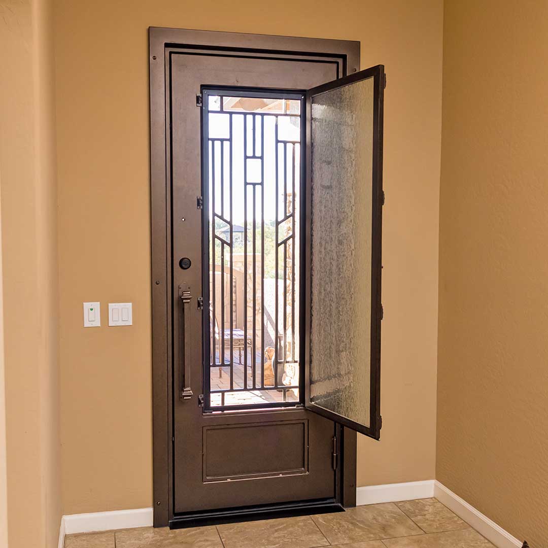 First Impression Ironworks Iron Entry Door with glass panel open for airflow