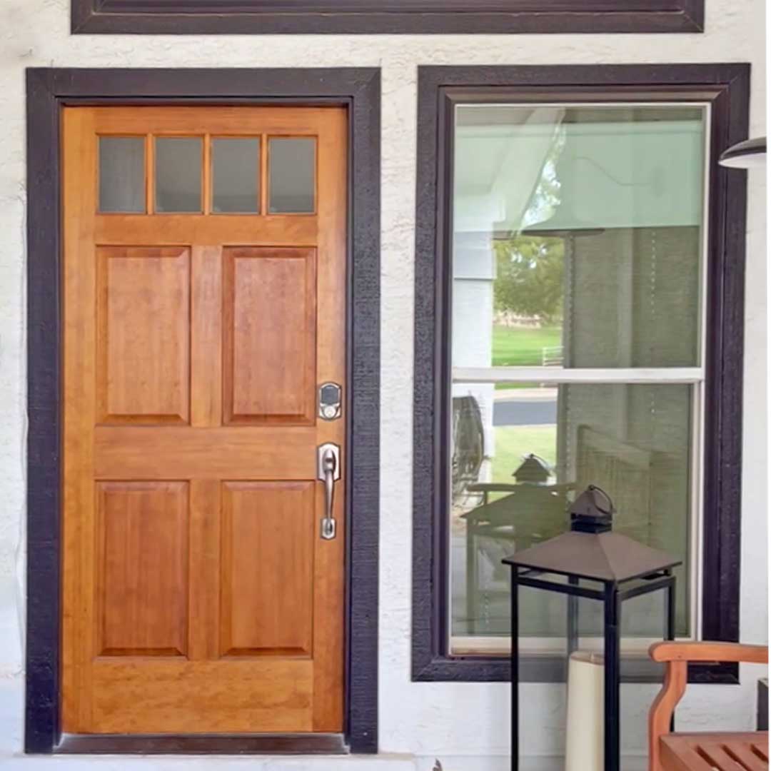 Before picture of entryway with wooden door and window