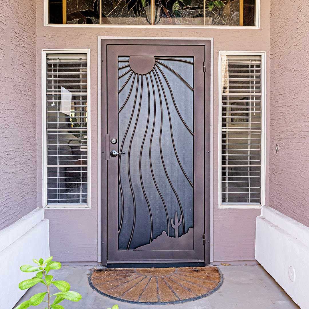 Beautiful First Impression Ironworks Entry Door with sun rays design with metal mesh