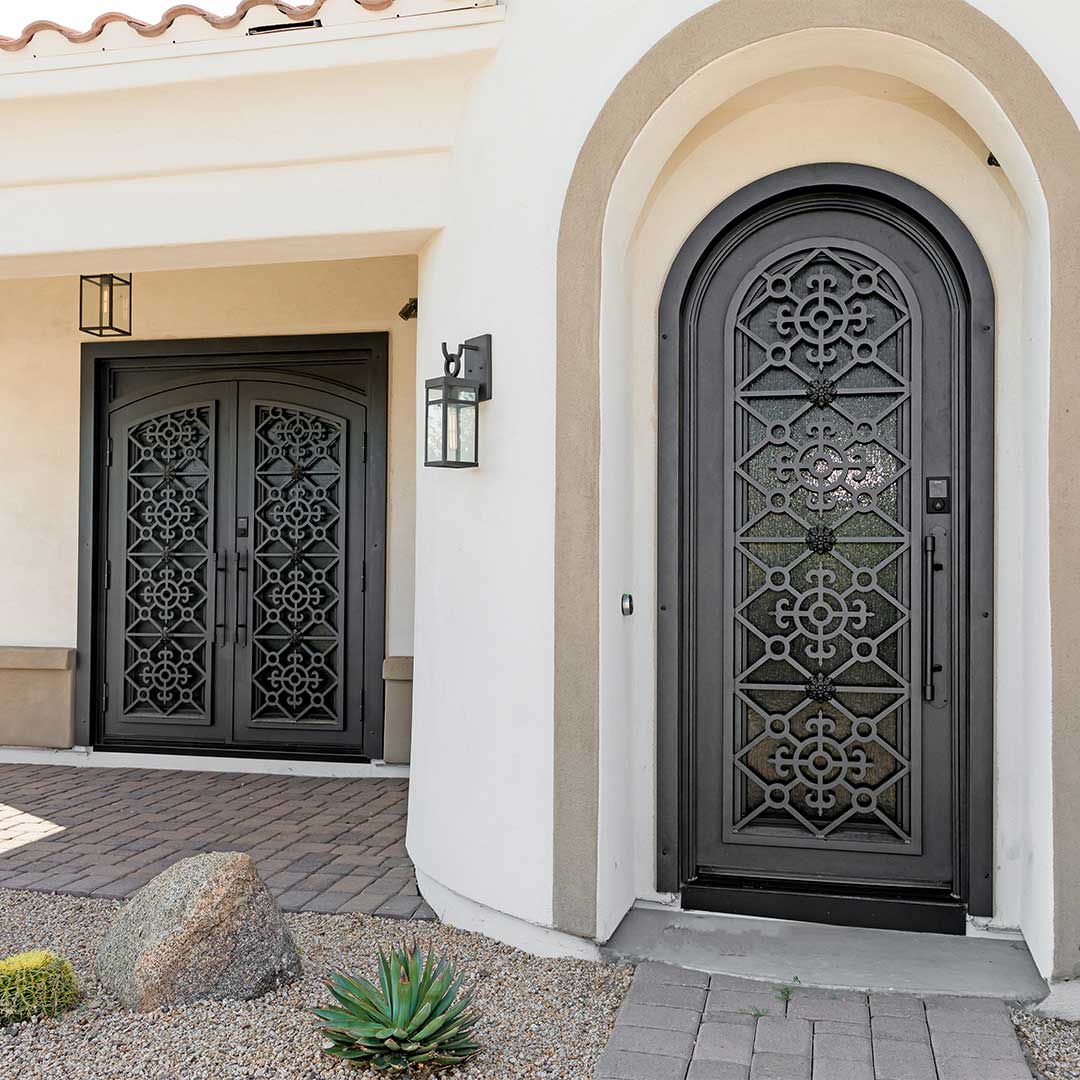 Two very intricate plasma cut First Impression Ironworks doors