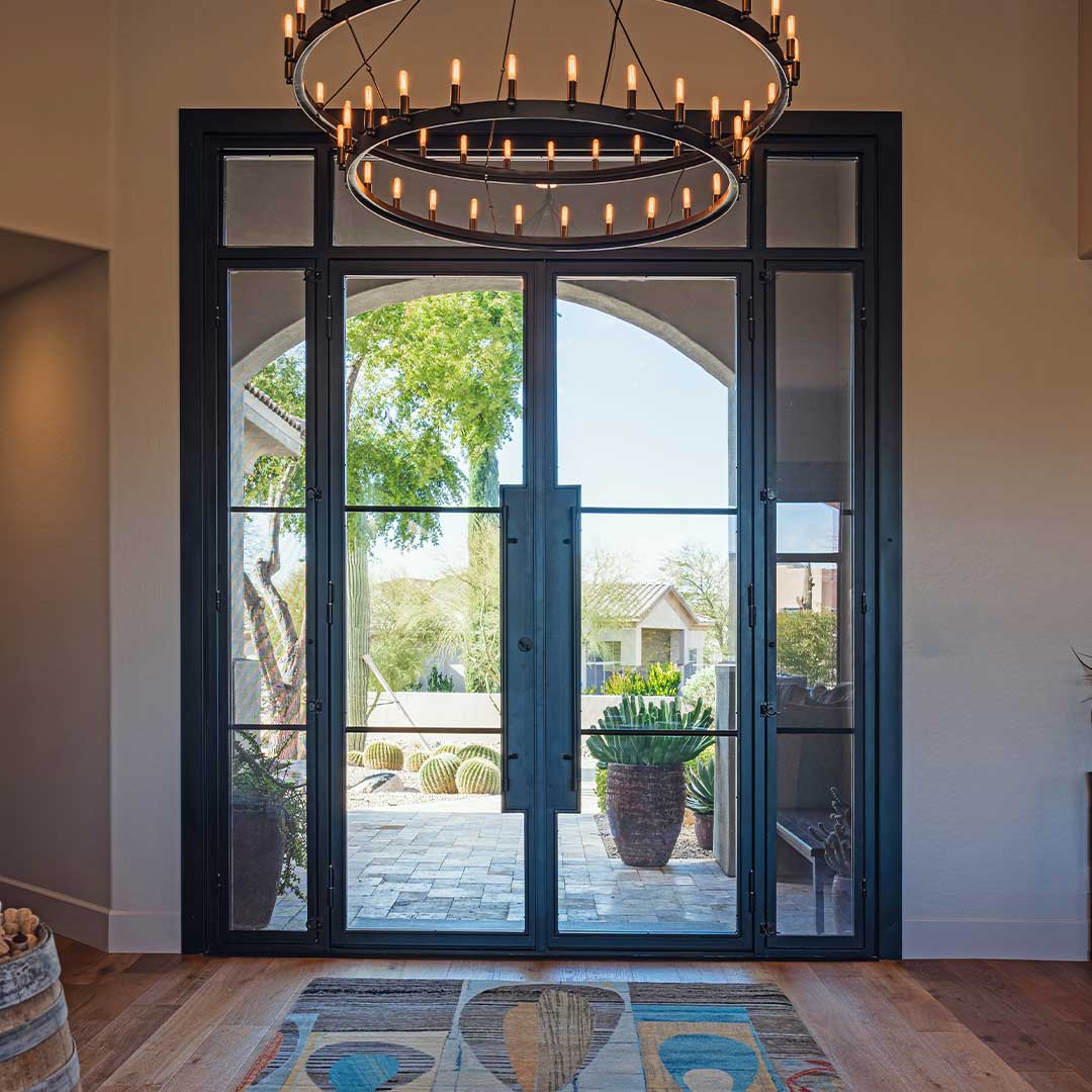 Modern Iron and Glass French Iron Entry Door made by First Impression Ironworks