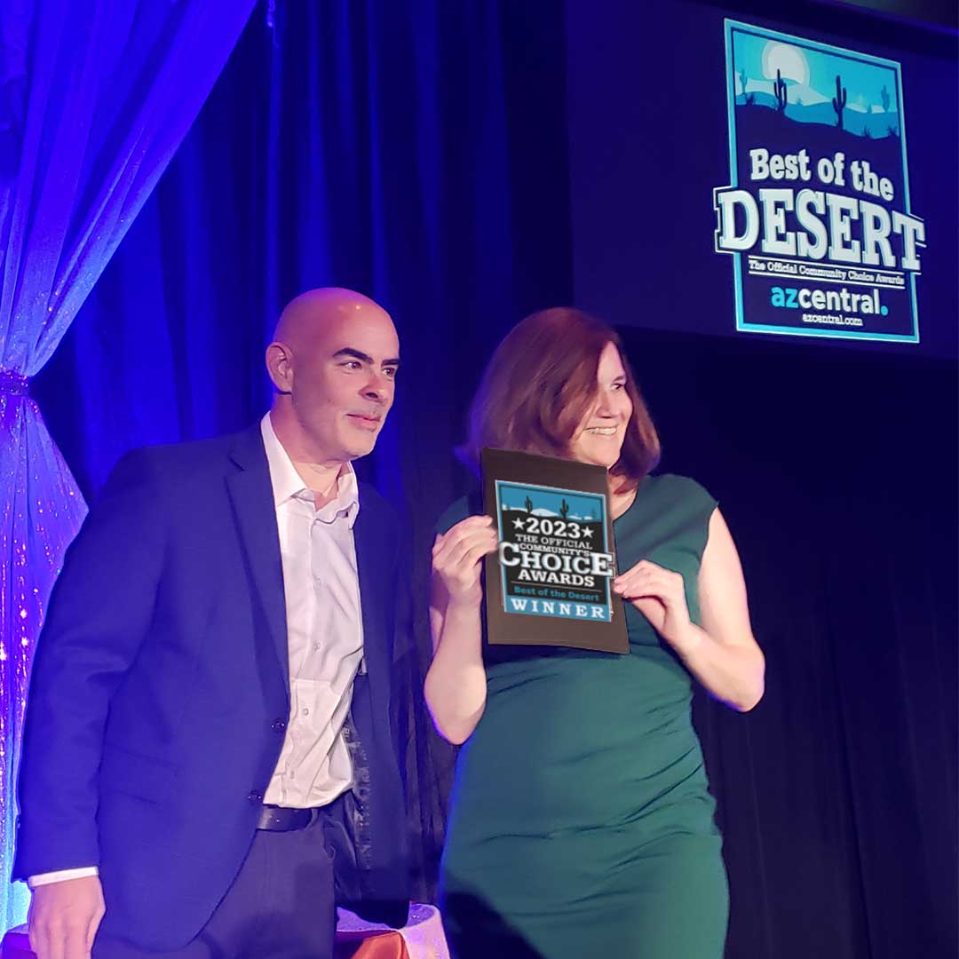 First Impression Ironworks employee holding 2023 Best of Desert winning plaque