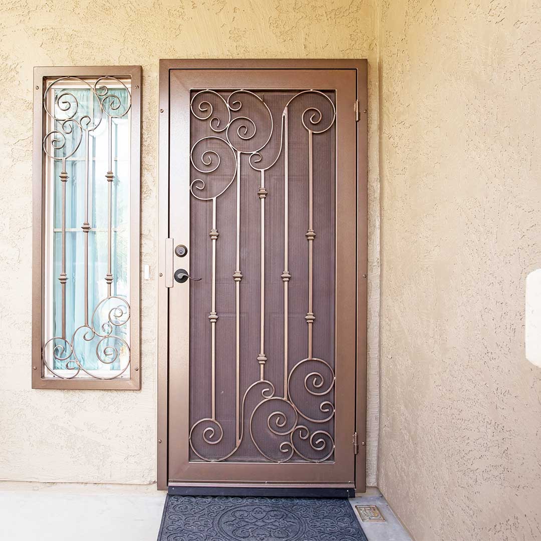 First Impression Ironworks Napa iron security door with a matching window guard