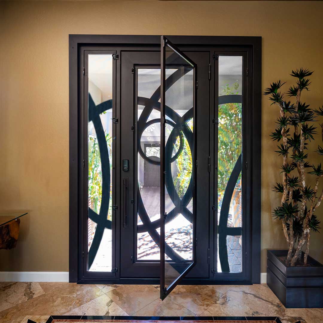 First Impression Ironworks Iron Entry Door with panel open to allow airflow through the house.