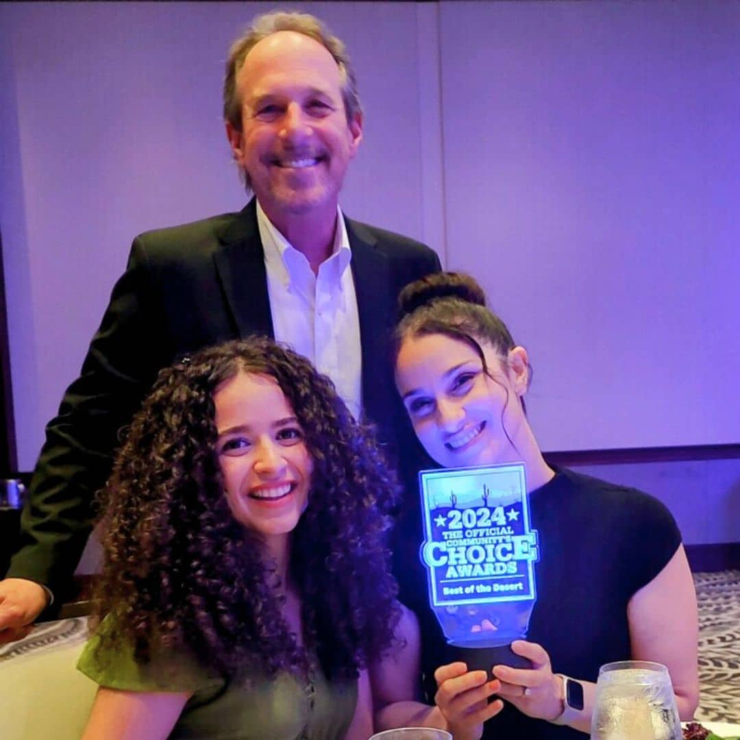 First Impression Ironworks employees posing with their Best of the Desert award