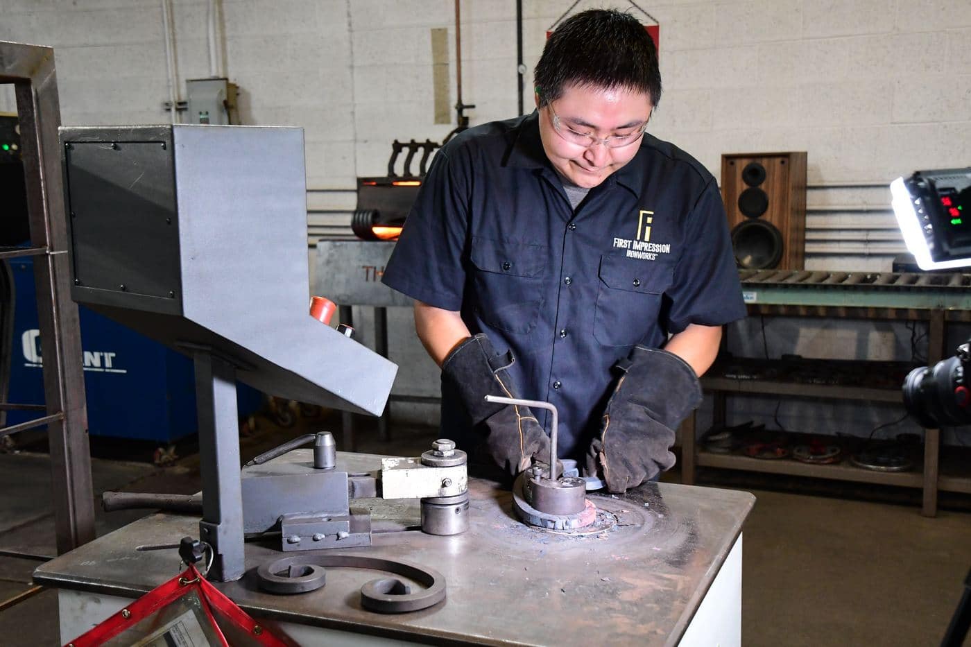 First Impression Ironworks artisan creating iron scrolls for an Iron Entry door.