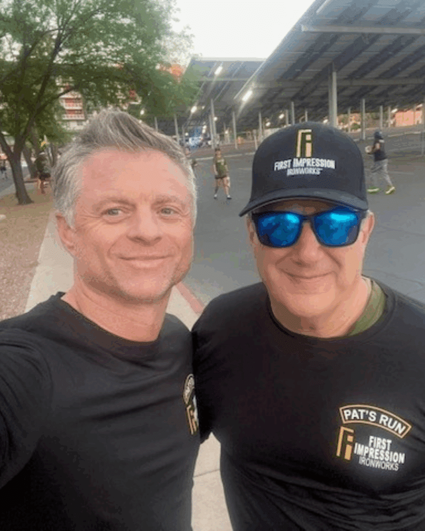 First Impression Ironworks  employees smiling for a picture at the Pat Tillman run