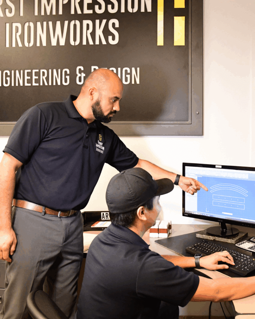 Engineering and CAD team collaborating on the design of the homeowner's custom iron railing