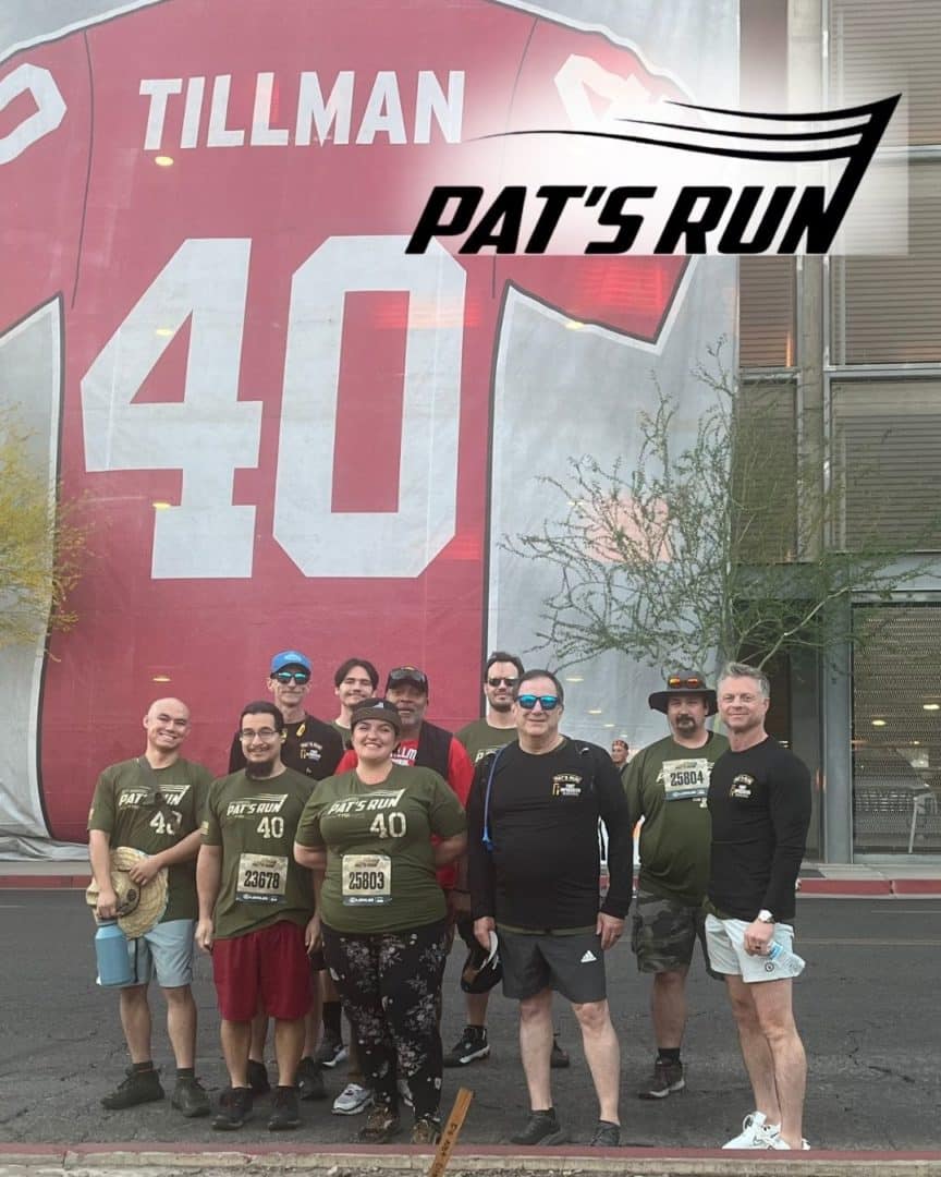 First Impression Ironworks team members posing for a picture at Pat's Run
