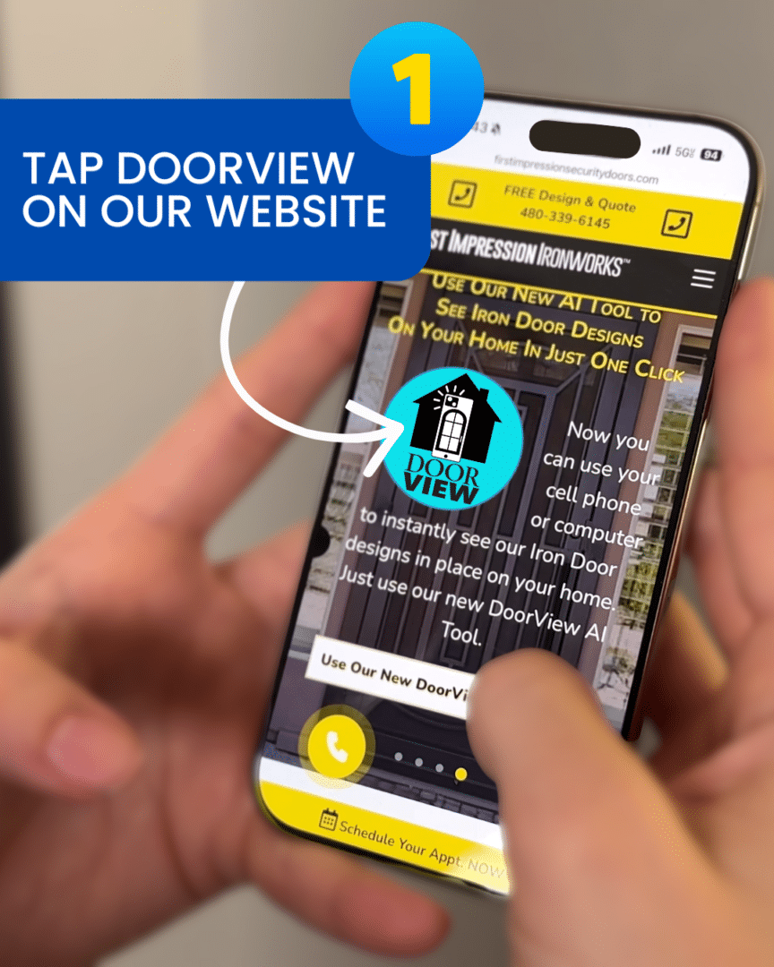 Hand holding a phone that is displaying DoorView on the First Impression Ironworks website, "Step 1: Tap DoorView on our website" text is overlaid on the image