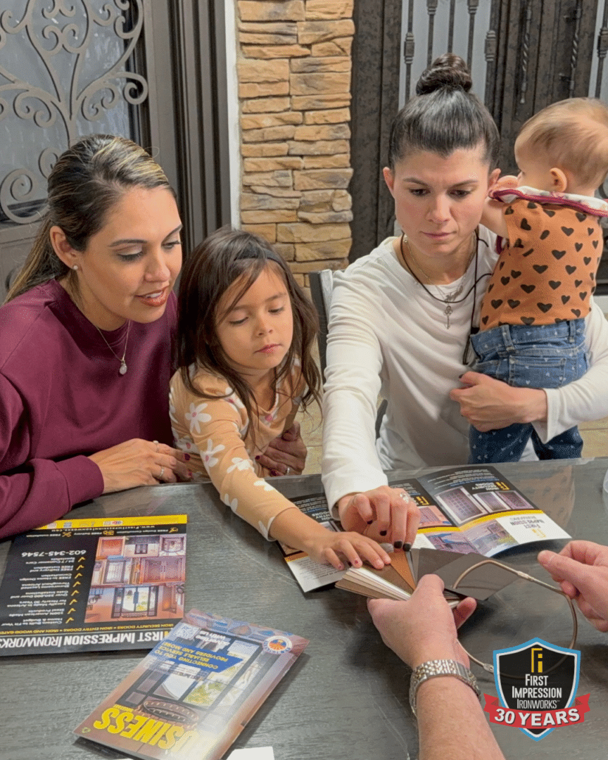 Family looking at powder coating samples in the First Impression Ironworks showroom