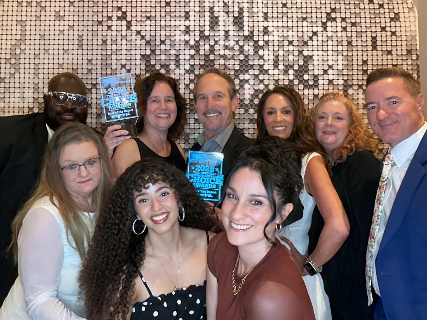 Group picture of the First Impression Ironworks team holding their award at the Best of the Desert Gala