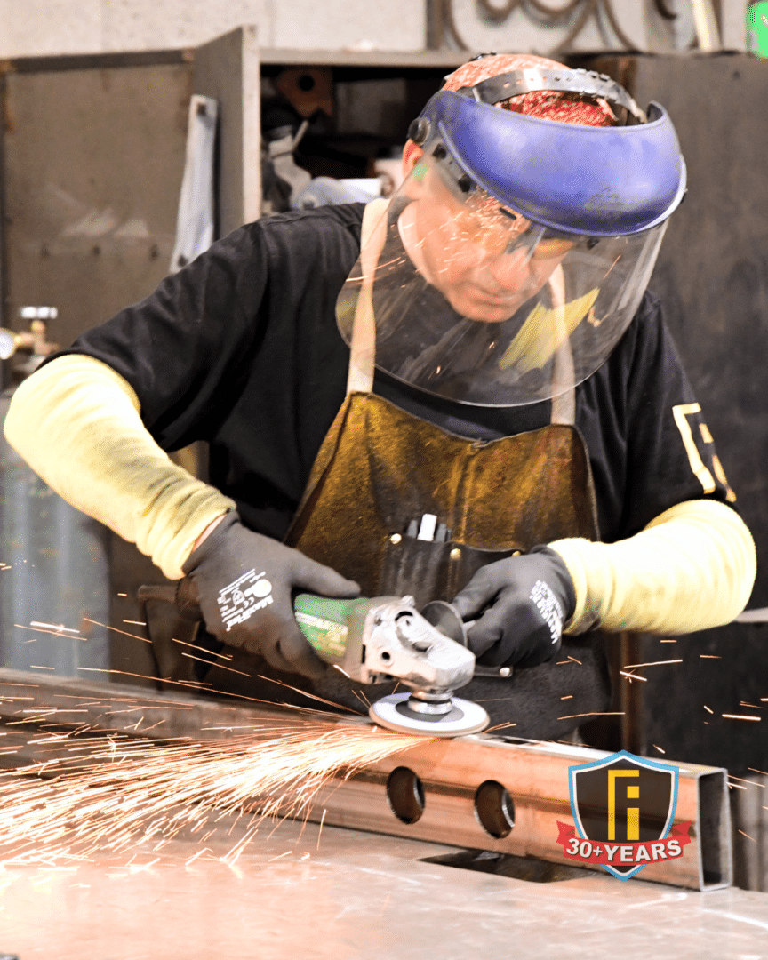 First Impression Ironworks Master Craftsman working on an Iron Door